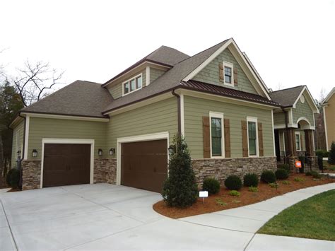 exterior house colors with brown metal roof|house colors with brown trim.